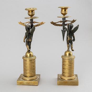 A pair of Empire candlesticks, first half of the 19th-century.