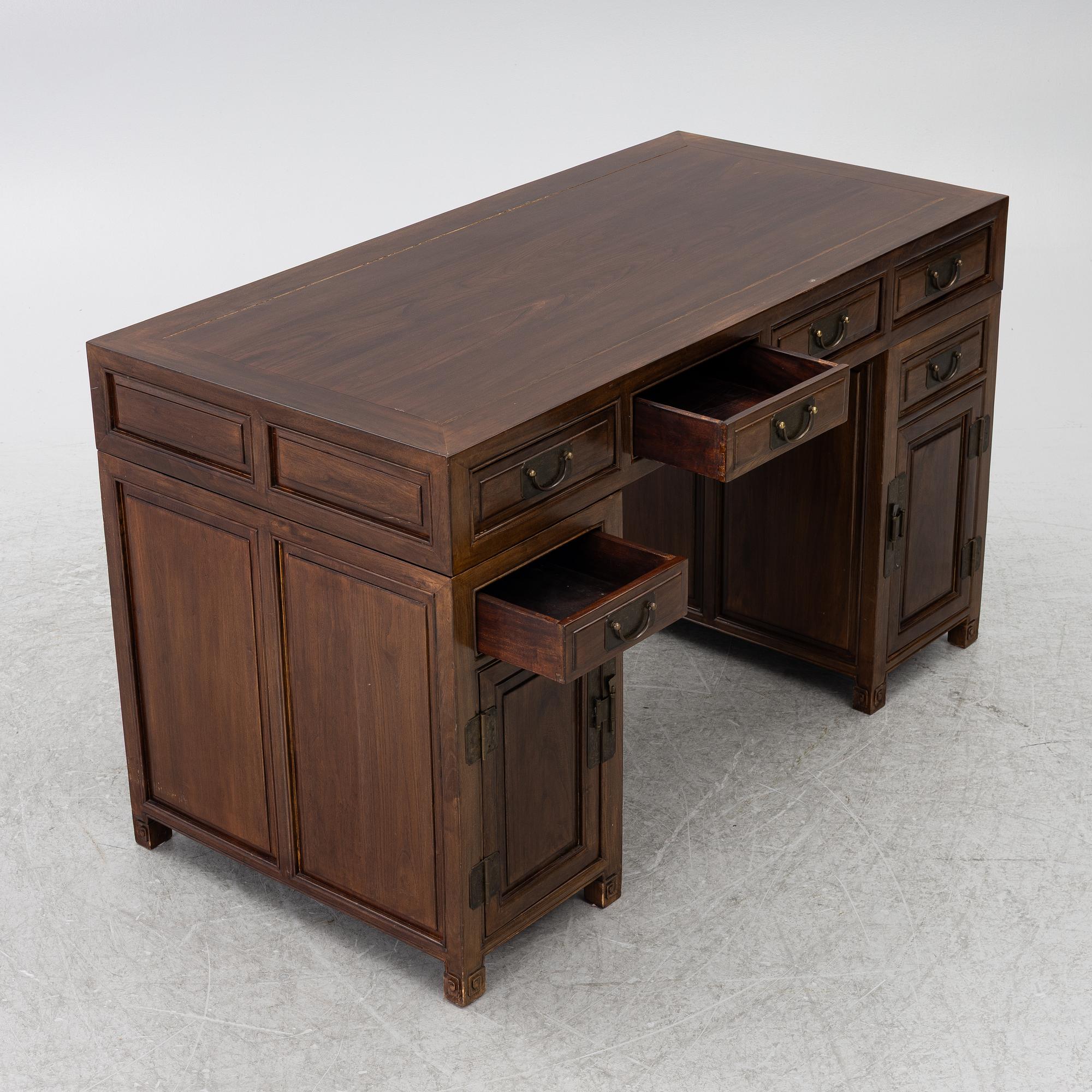 A Chinese hardwood desk, 20th century.