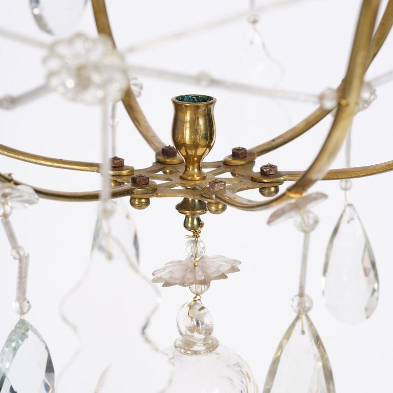 A seven-light gilt brass and cut glass rococo chandelier, mid 18th century.
