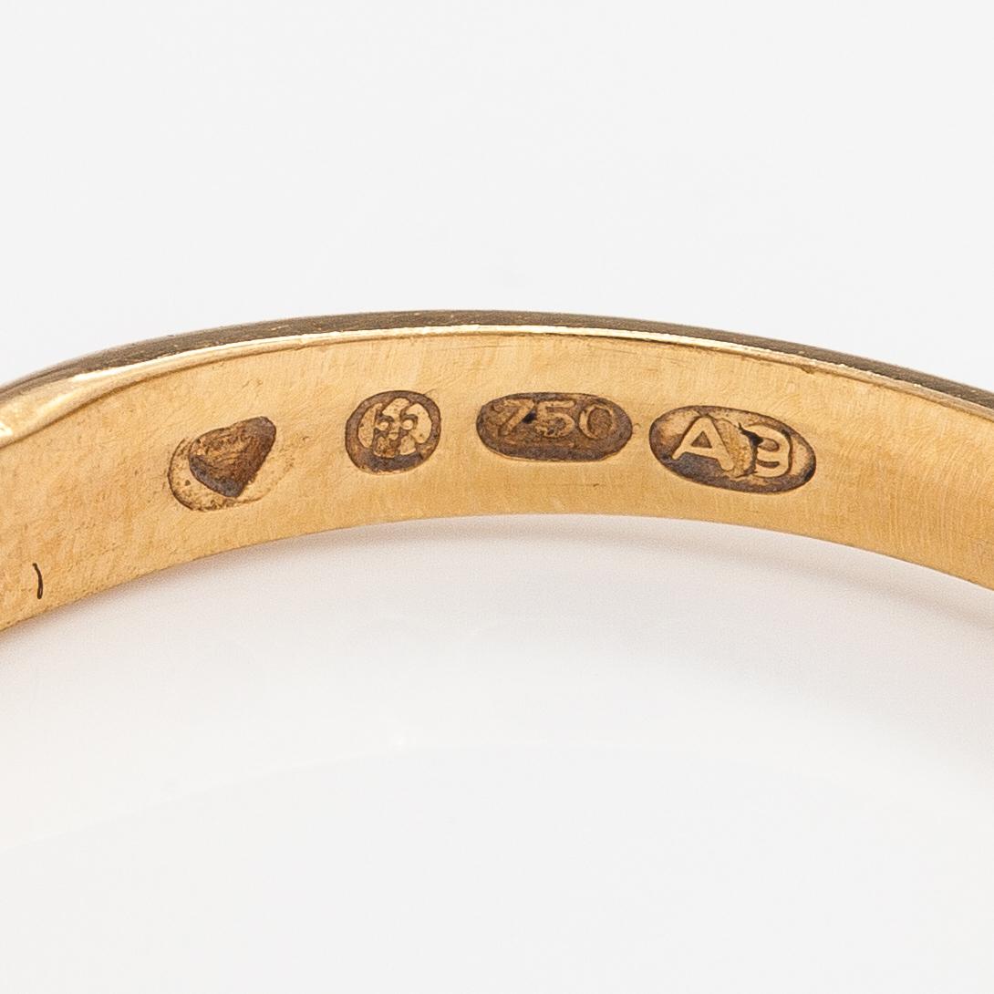 An 18K gold ring "Twined jewellery from Lampola in Halikko". Kalevala koru, Helsinki 1978.