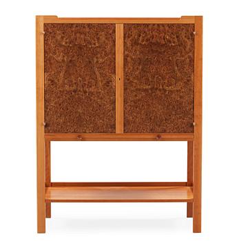 441. A Josef Frank mahogany and burrwood cabinet, Svenskt Tenn, model 2135.