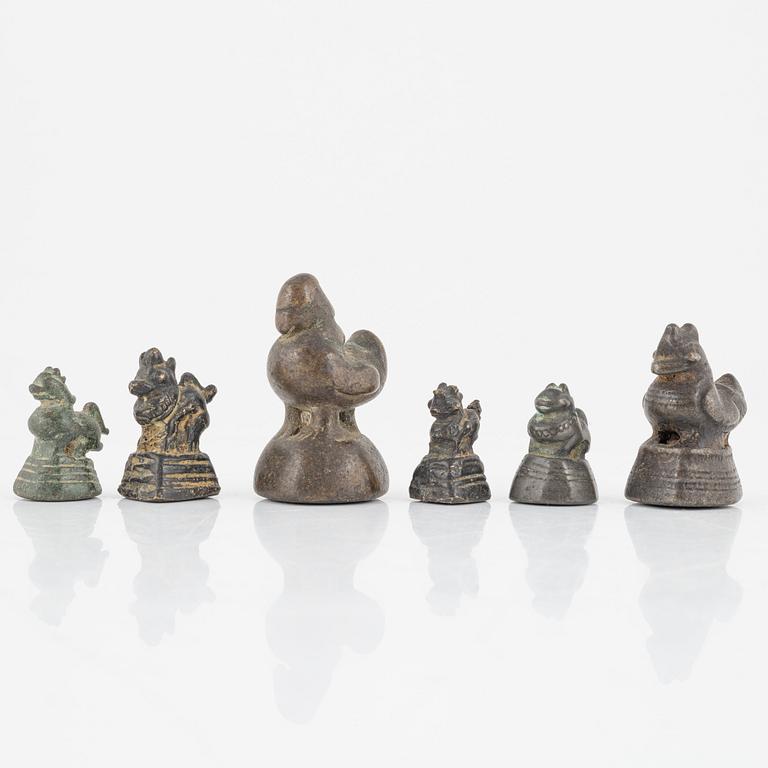 A group of six Burmese opium weights, 19th/20th Century.