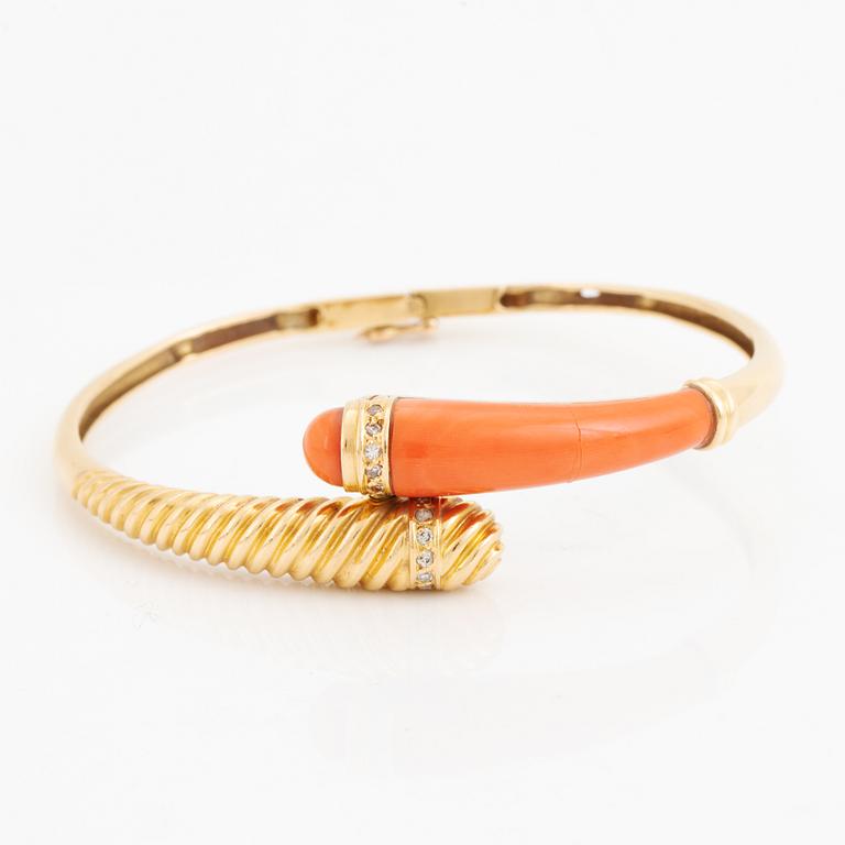 Gold and coral and diamond bangle.
