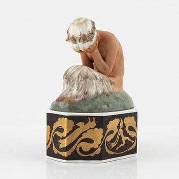 Gerhard Henning, A crying Faun porcelain figurine, Royal Copenhagen, Denmark, 1920's.