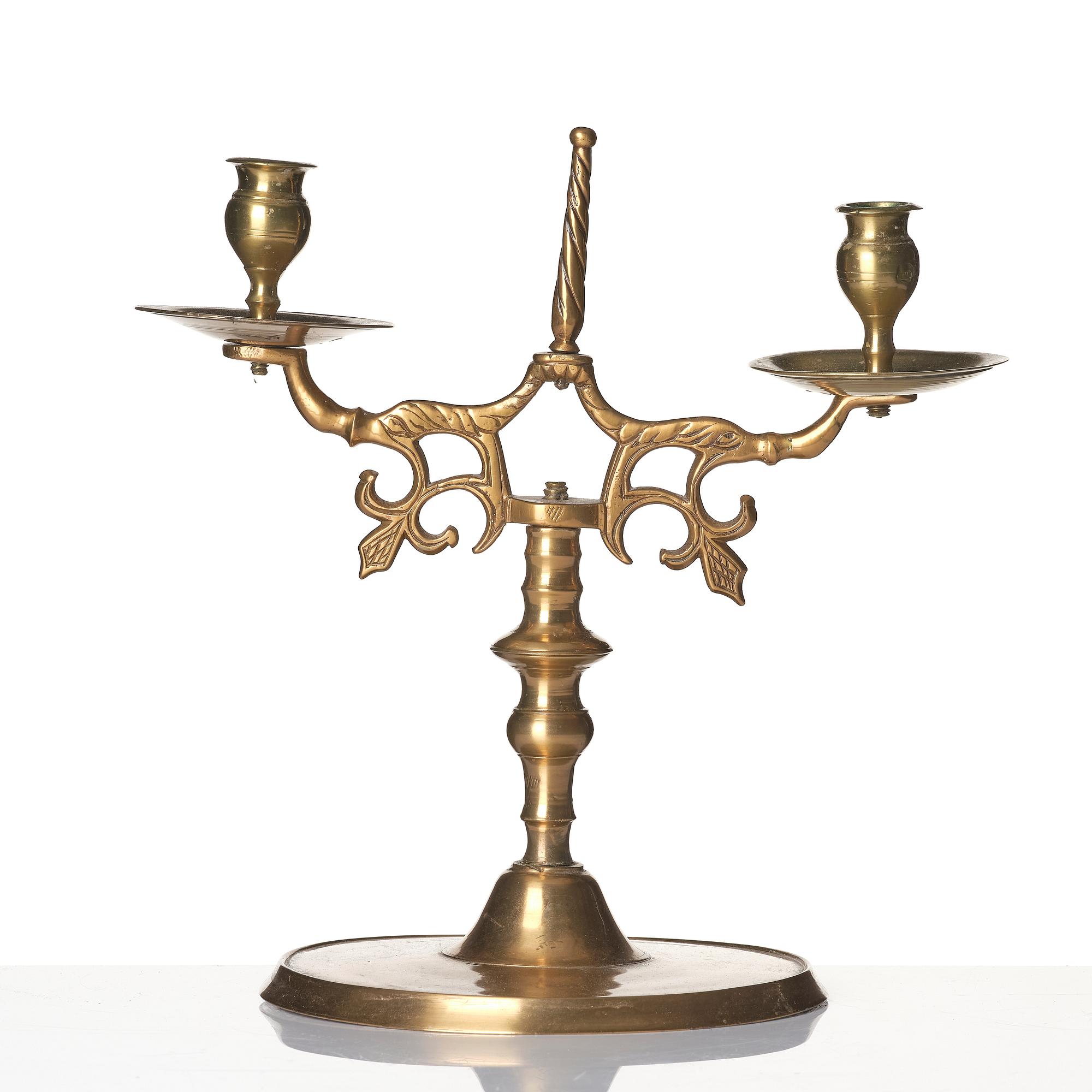 A baroque brass two-branch candelabra, Northern Europe/Sweden, 17th century.