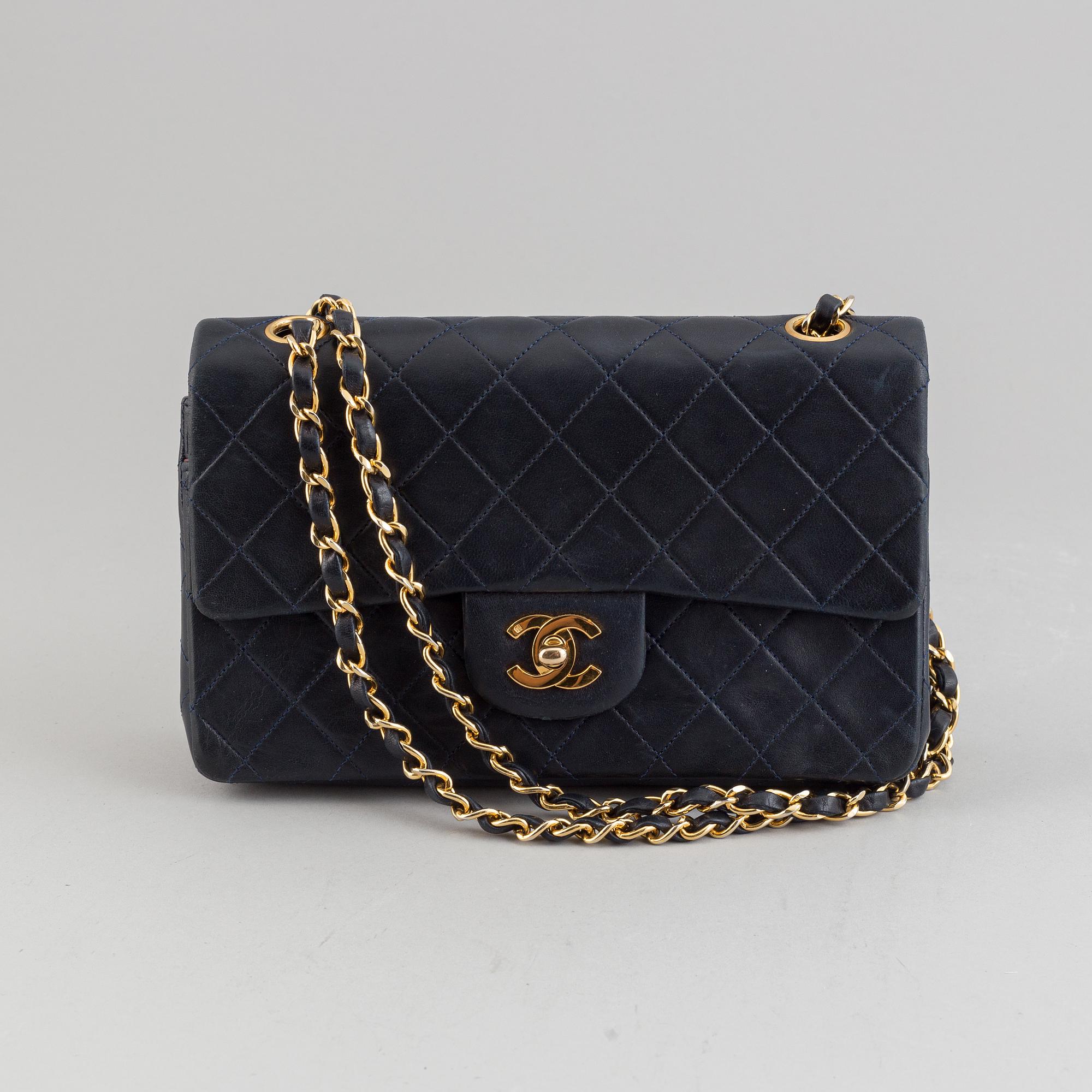 Chanel, a navy leather 'Double Flap Bag', 1989-91.