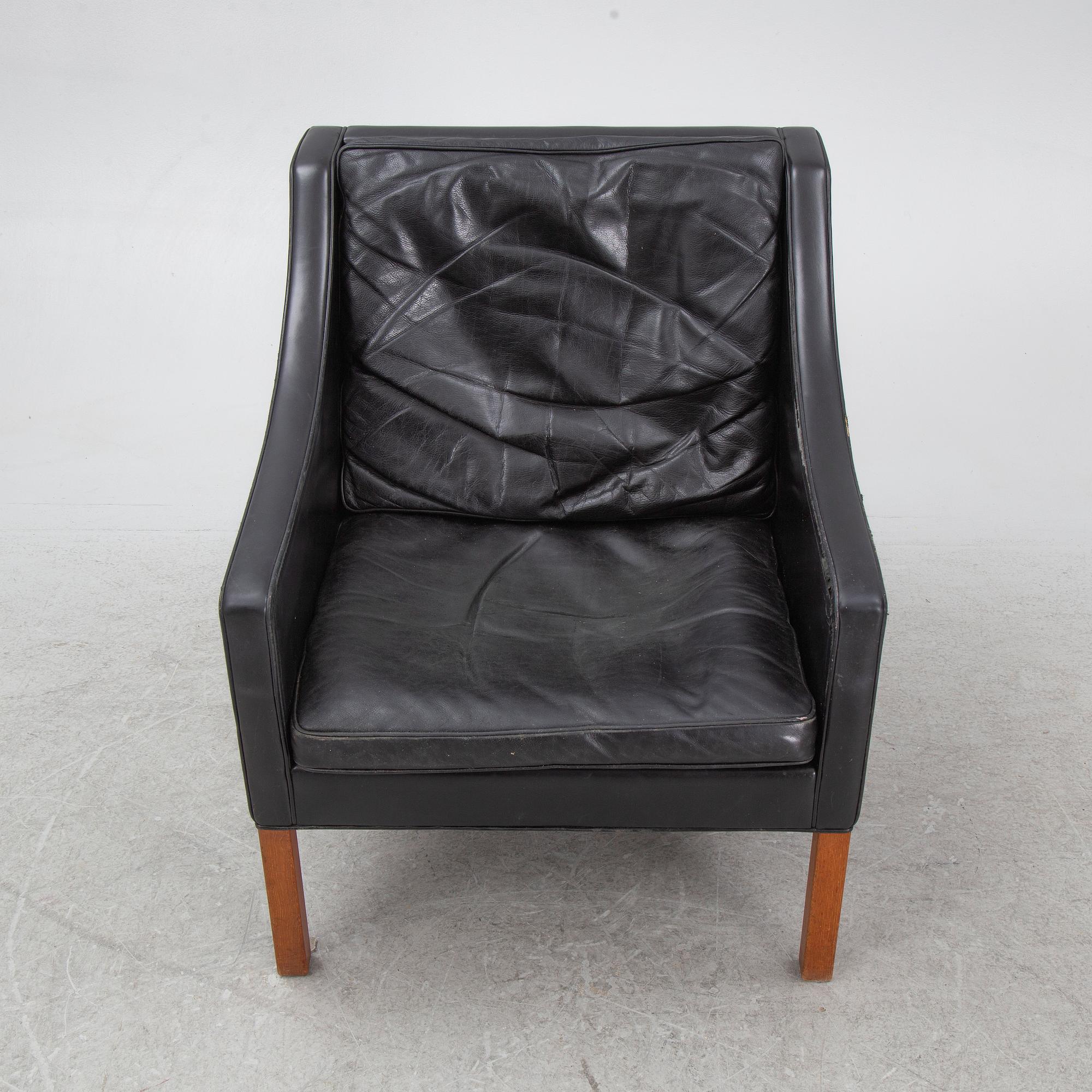 Børge Mogensen, a model 2207 armchair with ottoman, Fredericia Stolefabrik, Denmark, second half of the 20th century.