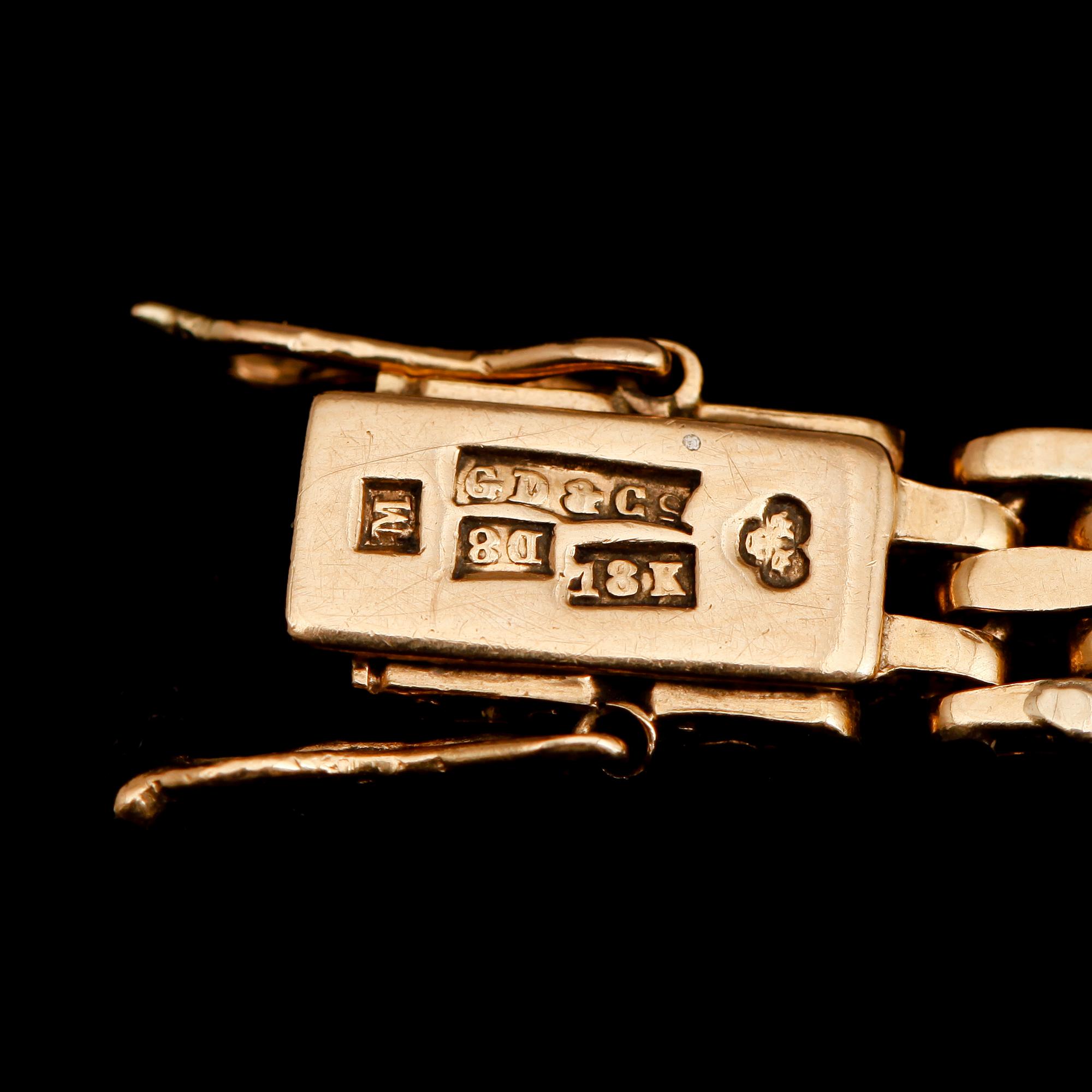 ARMBAND, 18 k guld, 1930. Vikt 13 g.