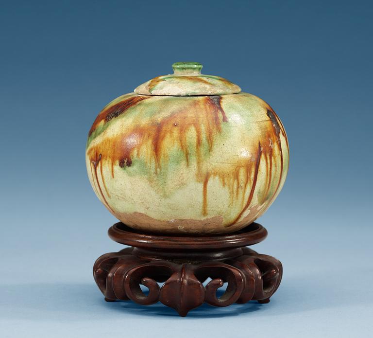A sancai glazed jar with cover, Tang dynasty (618-907 AD.).
