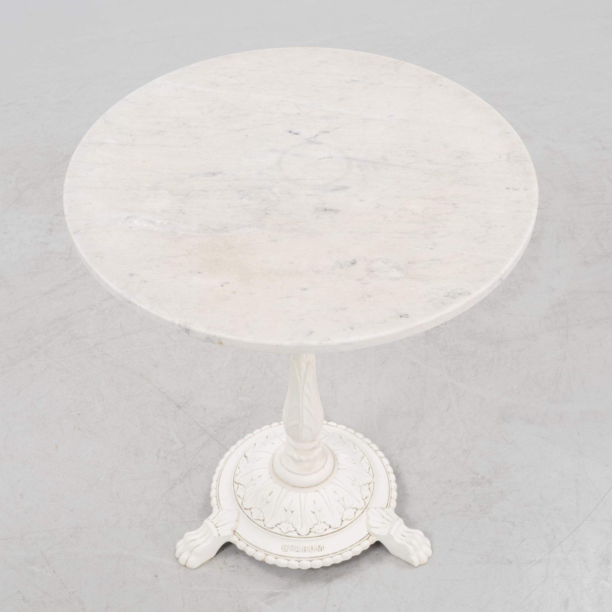 A Byarum garden table later part of the 20th century.