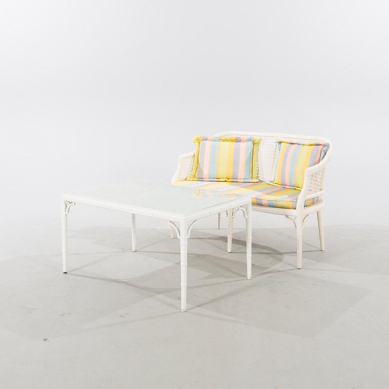 A late 20th century Miranda sofa and table.