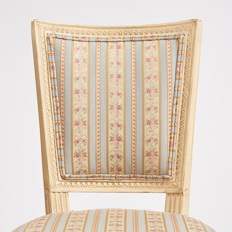 A set of nine Gustavian chairs by A Hellman (master in Stockholm 1761-94) and E Ståhl (master in Stockholm 1794-1820).