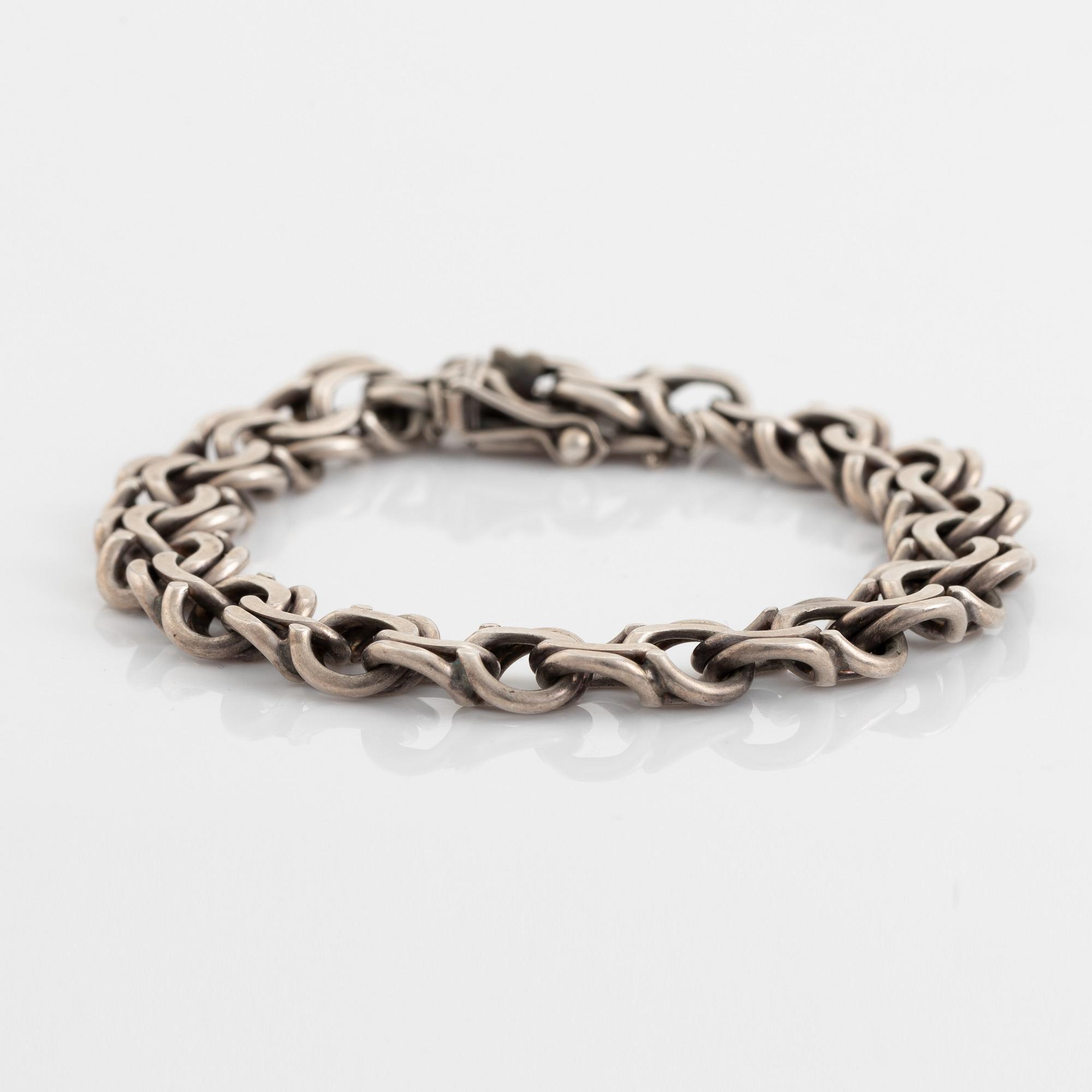 Silver bracelet.