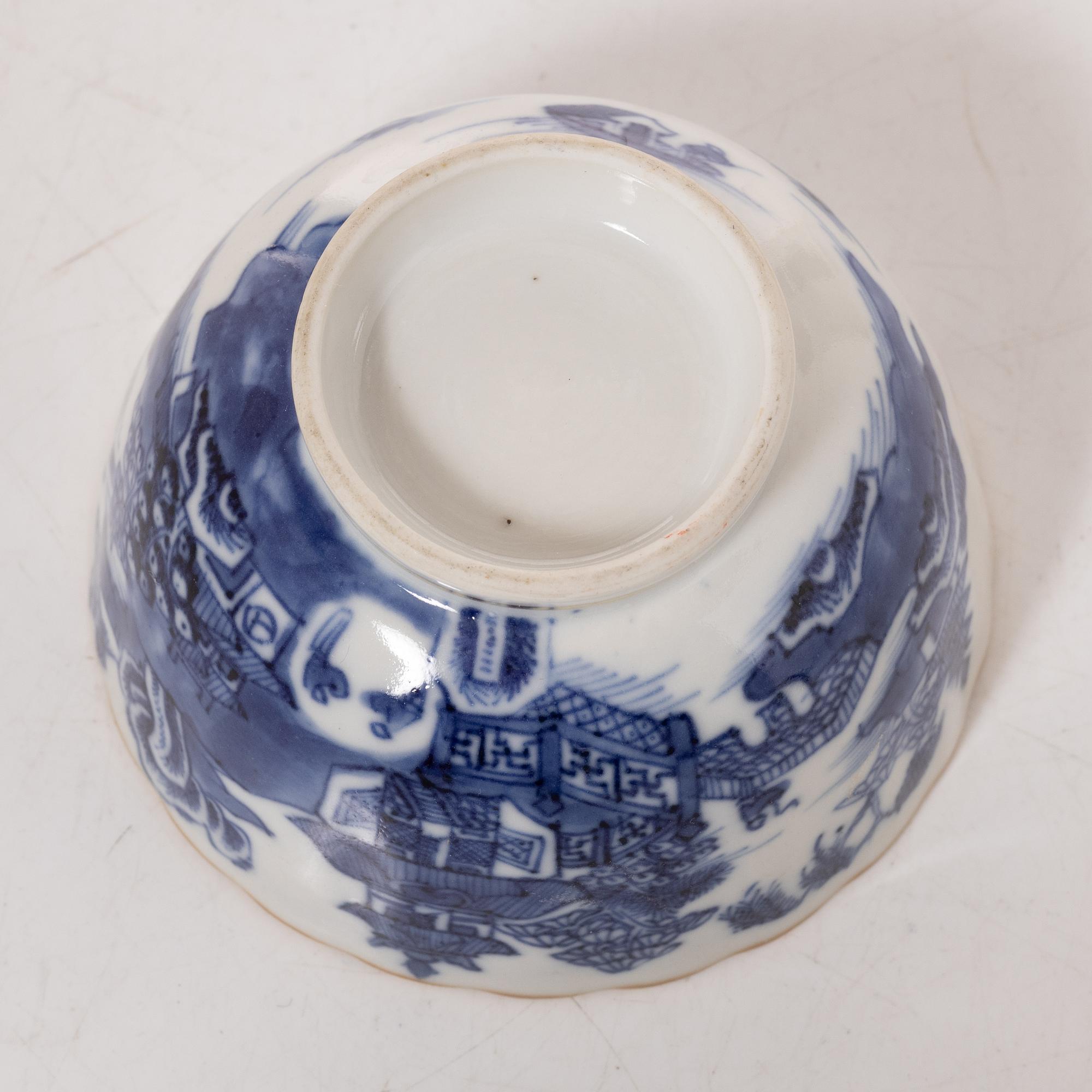 A group  of three serving dishes, a serving bowl, a cup, and seven plates, porcelain, including China 18th century.