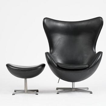 Arne Jacobsen, an "Egg" chair with ottoman, Fritz Hansen, Denmark, 2001.