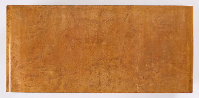 Swedish Modern, a birch veneered coffee table, 1930s-40s.