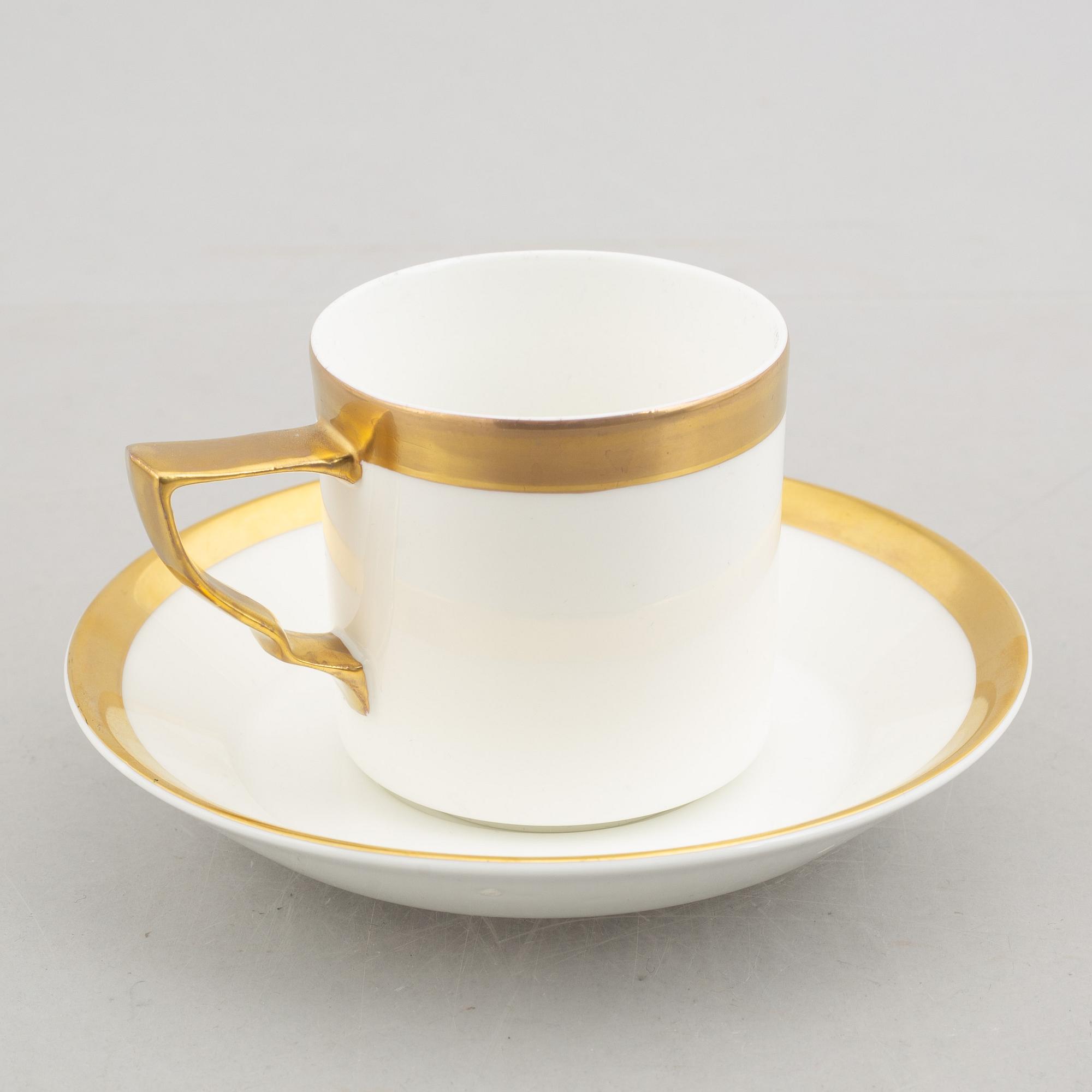 Karin Björquist, five 'Nobel' bone china coffee cups with saucers, Rörstrand.