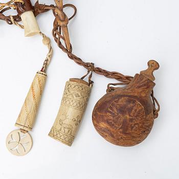 Half-horn knives, cup, bottle, needle case.