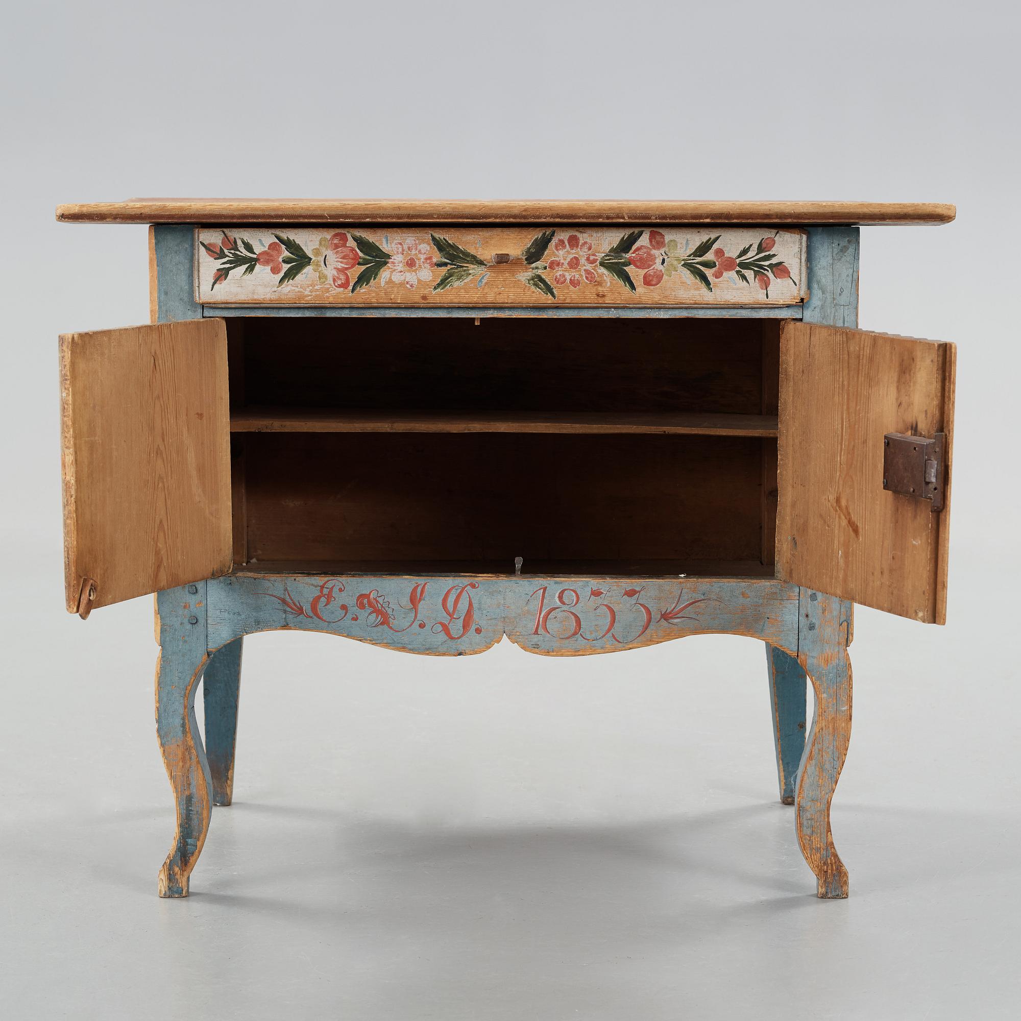 A painted pine table marked E.S.D 1833.