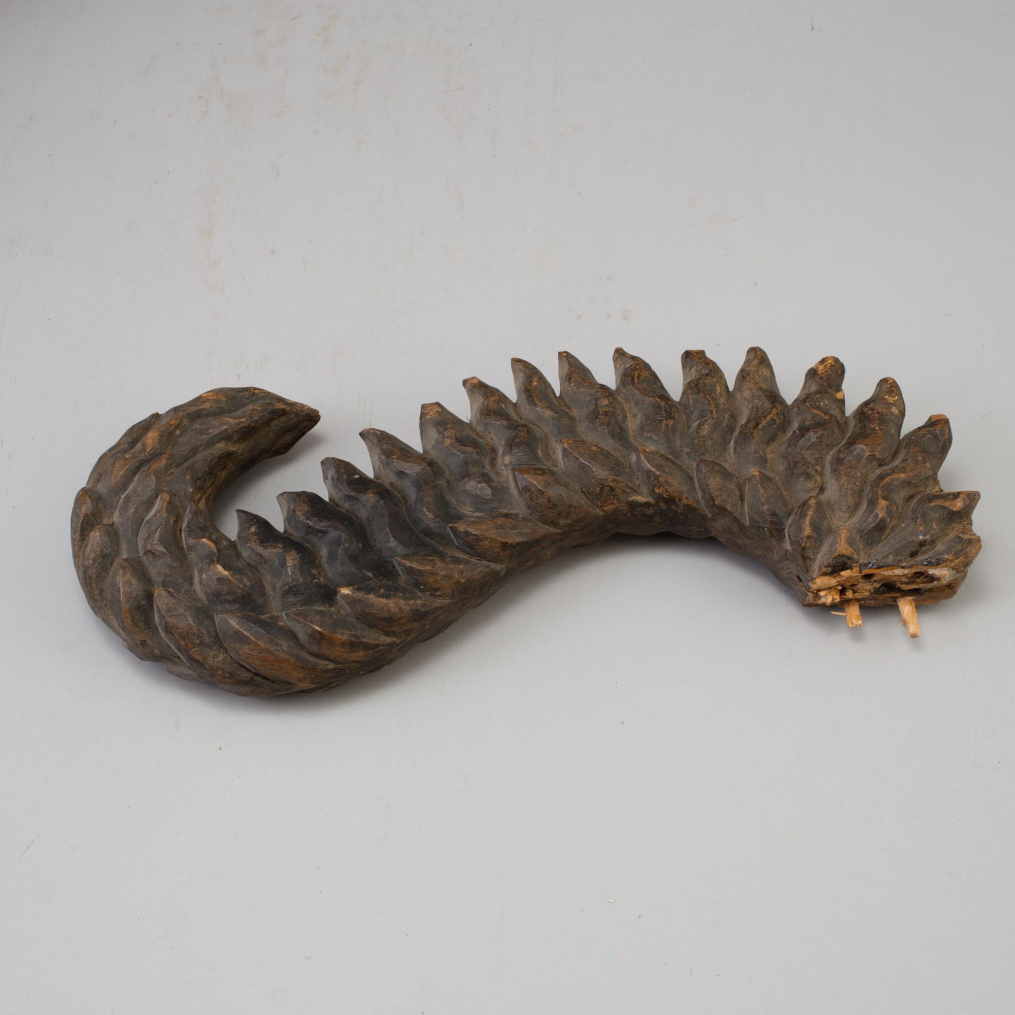 A wooden mythical beast, Southeast Asia, early 20th Century.