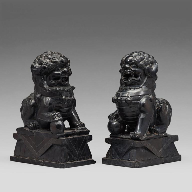 A pair of Chinese buddhist lions in stone, 20th Century.