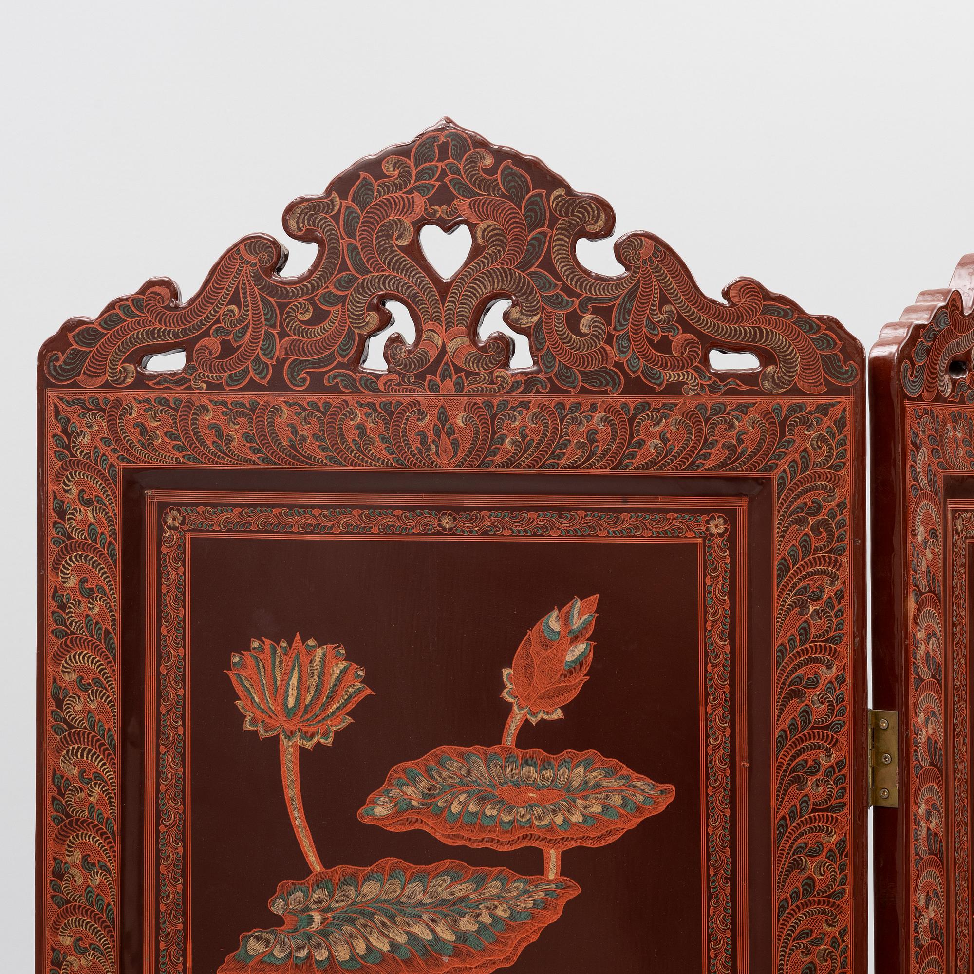 A folding screen, south east Asia, second half of the 20th century.