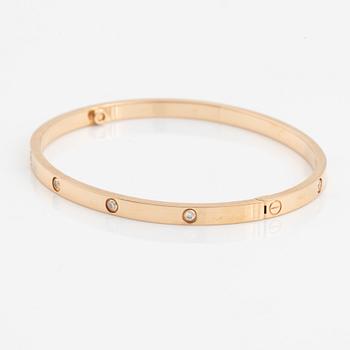 Cartier "Love" liten modell armband 18K roséguld med tio runda briljantslipade diamanter.