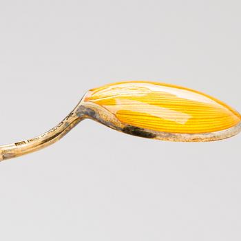 Tillander, a set of twelve enamelled gilt silver spoons, Helsinki 1951.