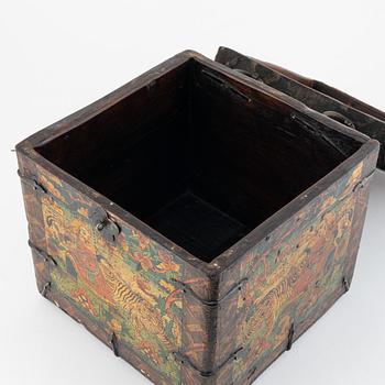 A Tibetan patinated lacquered wooden box, 20th century.