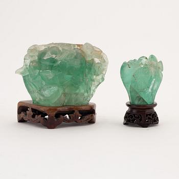 Two Chinese green stone sculptures, early 20th Century.