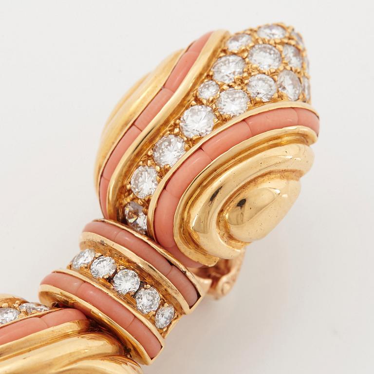 A pair of 18K gold Boucheron earrings set with round brilliant-cut diamonds and coral.