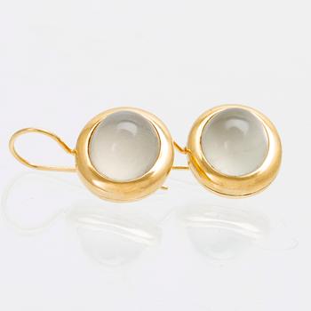 A pair of 18K gold earrings "Emeli" with cabochon-cut moonstone from Ole Lynggaard.