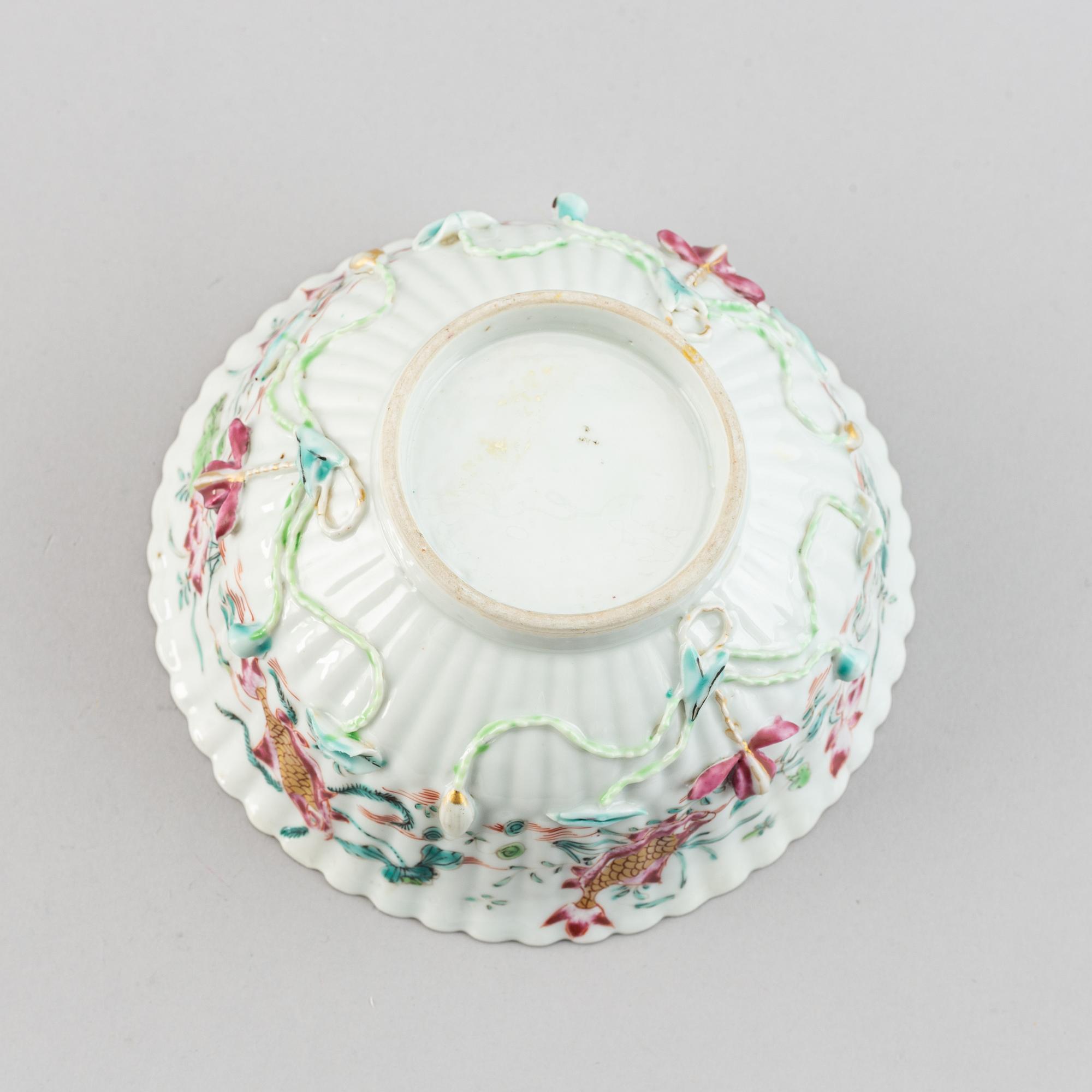 A famille rose relief moulded bowl, Qing dynasty, 18th century.