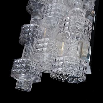 A pair of wall lamps by Gert Nyström for Fagerhult, second half of the 20th century.