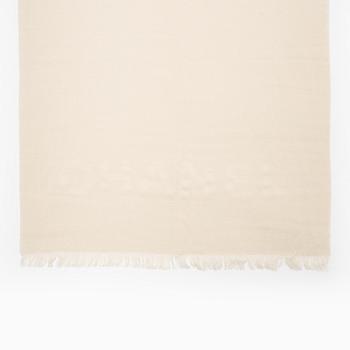 Chanel, a cashmere and silk-mix shawl.