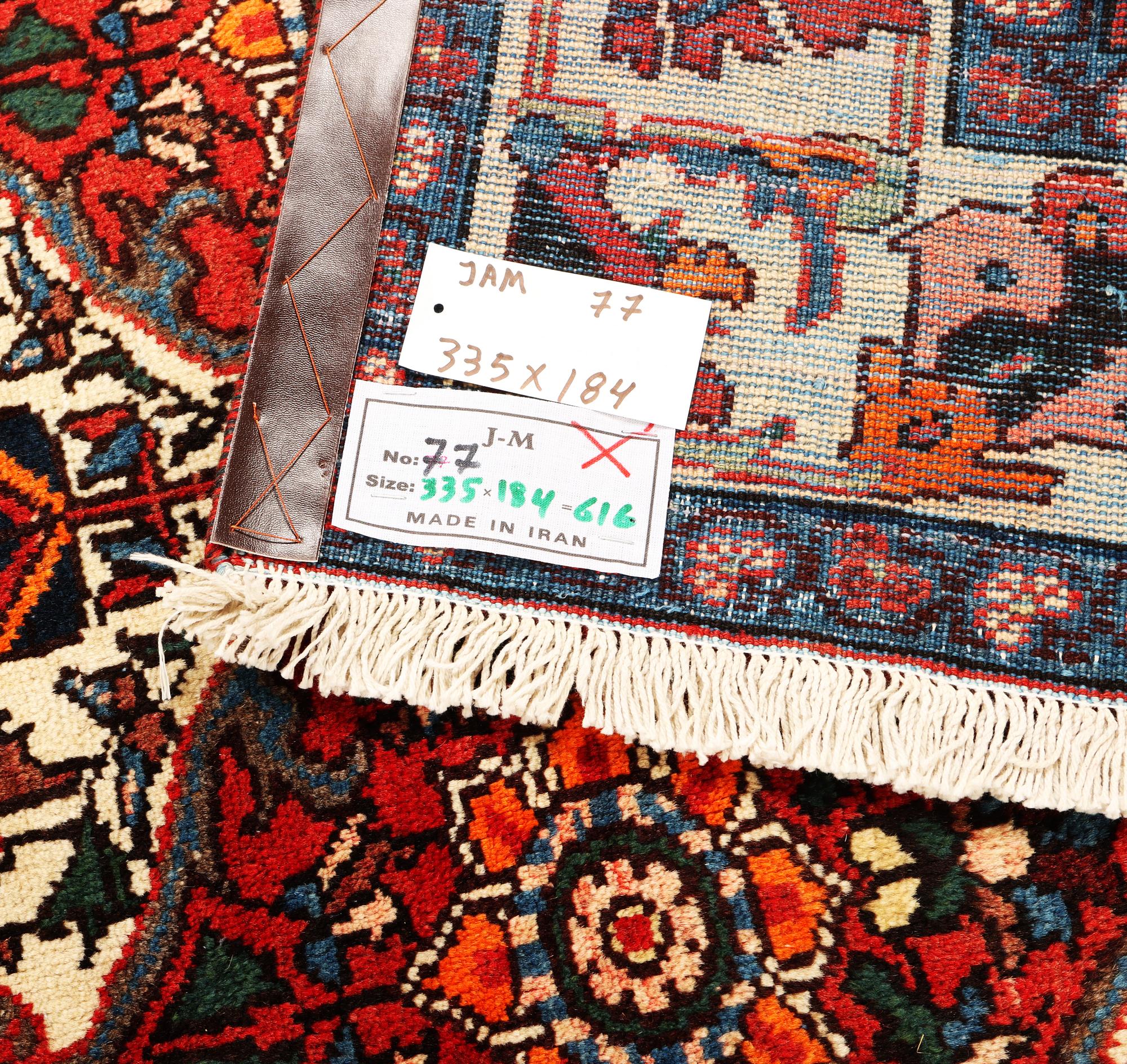 A Hamadan carpet, a. 335 x 184 cm.