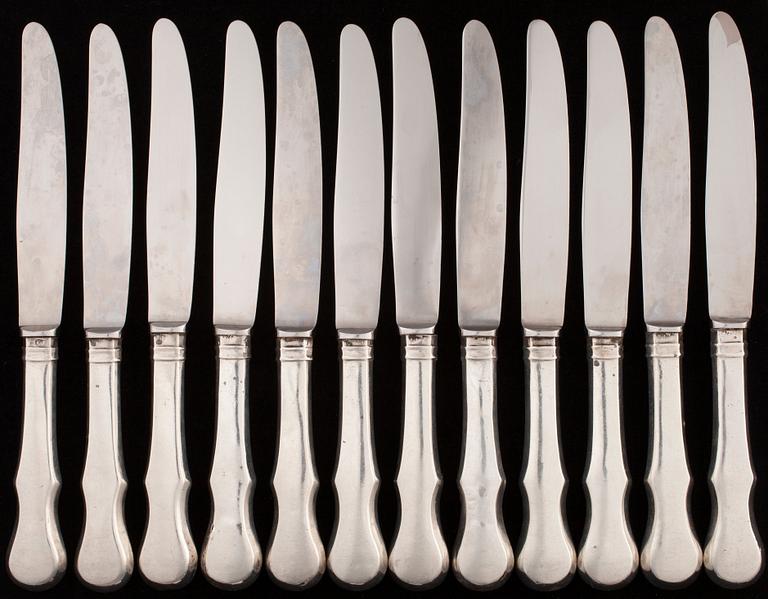 A SET OF RUSSIAN CUTLERY, 12+12+11.