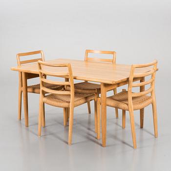 A SET OF 4 CHAIRS AND A TABLE BY Niels O Möller.