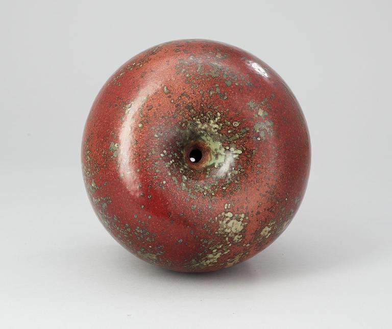 A Hans Hedberg faience apple, Biot, France.