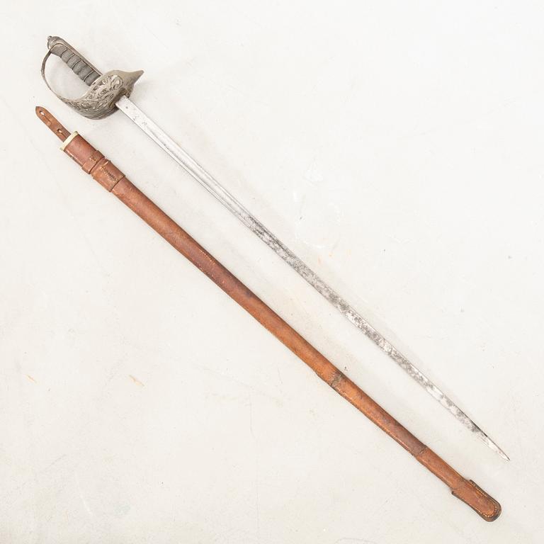 A British sabre 1897 pattern, with scabbard.