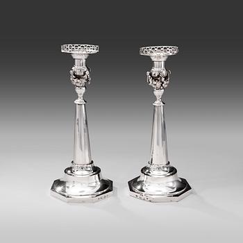 524. A PAIR OF EMPIRE CANDLESTICKS.