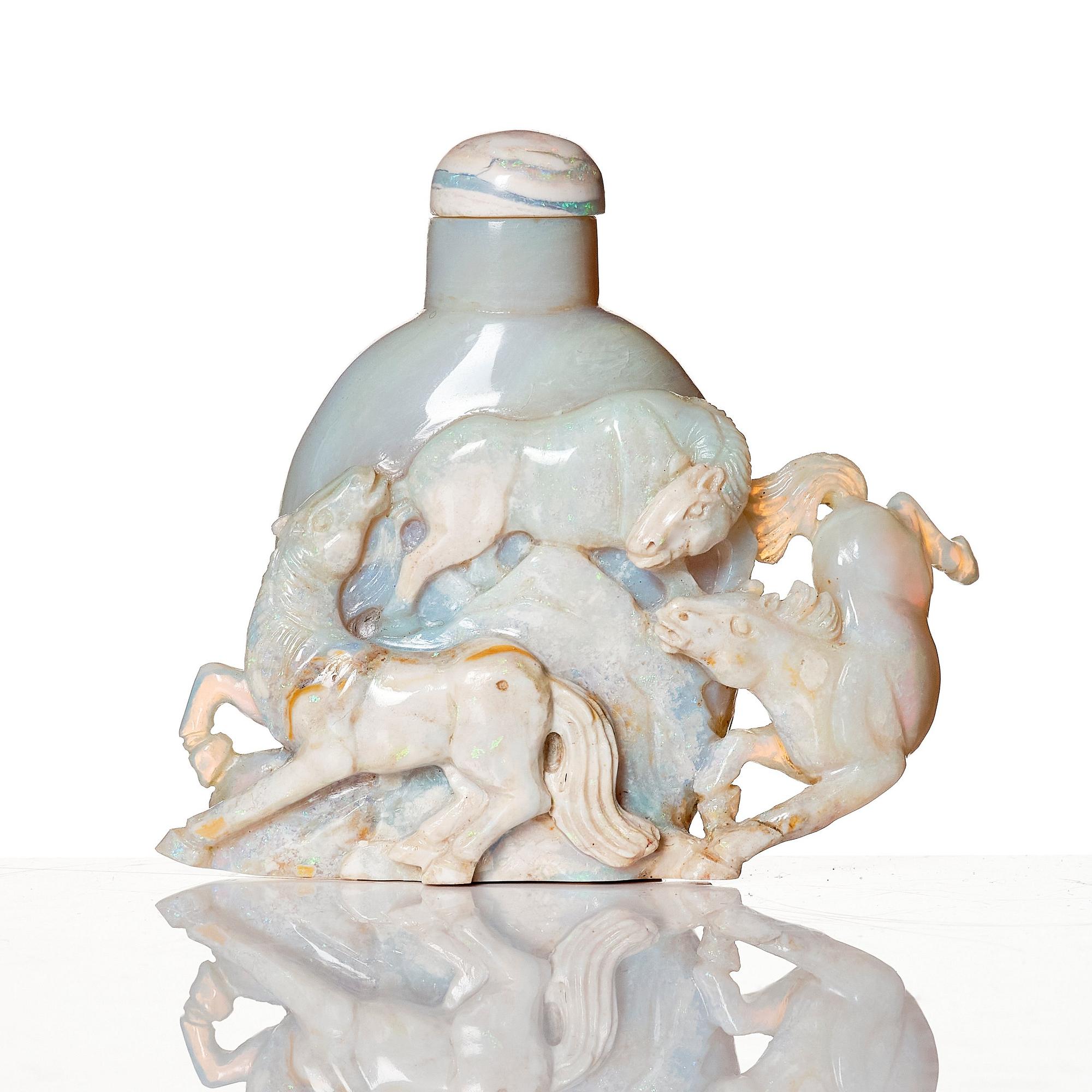 A set of six Chinese sculpted snuff bottles, 20th Century.