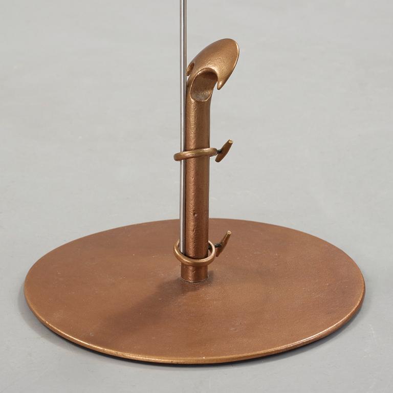 Tore Ahlsén, a bronze and white metal floor lamp, 'Napoleon on the Nile', probably executed by NK, 1940's.