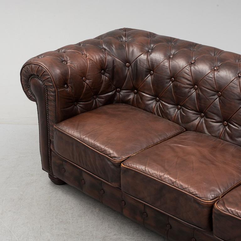 A 20th century leather upholstered Chesterfield sofa by Rubelli.