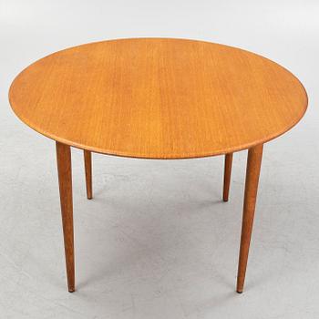 A Scandinavian dining table, 1950's/60's.