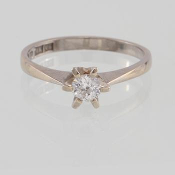 RING, 18K vitguld med briljantslipad diamant ca 0.27 ct, Bengt Andersson, Stockholm, 1971.Vikt 2,8 gram.