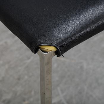 A set of eight steel and leather chairs, 21th century.