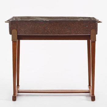 Josef Frank, a rare flower table with copper box model "2084", Firma Svenskt Tenn, mid-20th century.