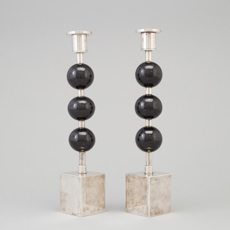 SIGURD PERSSON, a pair of silver plate and diabase candle sticks.