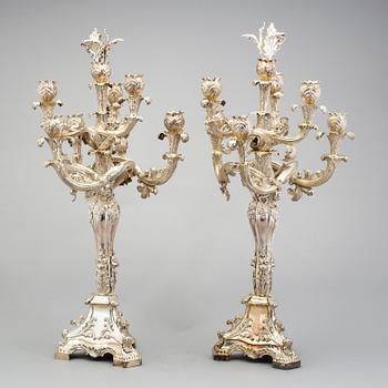 A pair of Neo-Rococo silver candelabra by Gustaf Möllenborg, Stockholm, 1845. Total weight ca 5920 grams.